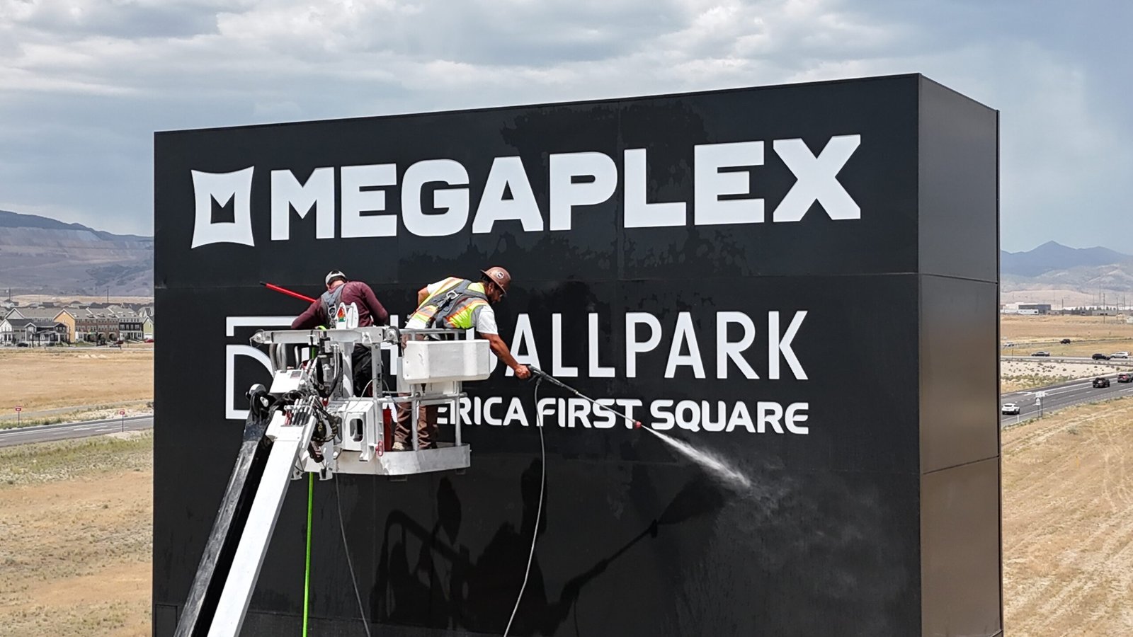 Pressure washing digital billboard