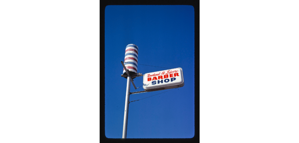 Old pole sign of barber shop